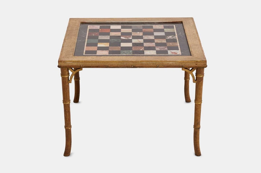 A Regency-style painted and parcel-gilt specimen marble coffee table, 20th century, (1 of 3)