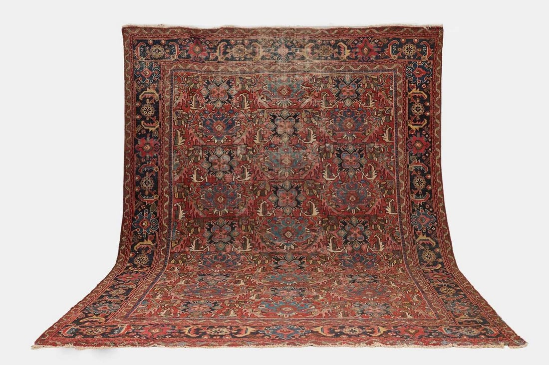 A Mahal wool carpet, early 20th century, Persian,: A Mahal wool carpet, early 20th century, Persian, woven with geometric and foliate motifs to a red ground (416 x 332cm) Condition Report: Fairly good condition overall. With general wear, commensurate