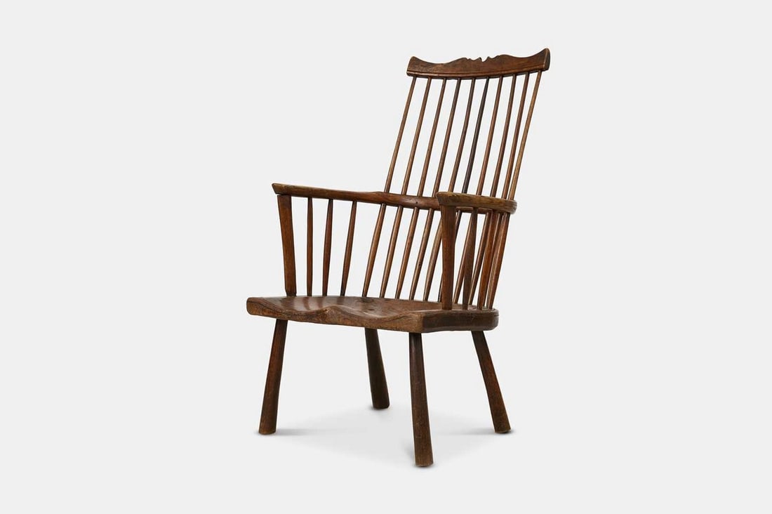 An ash and elm comb-back Windsor armchair, late 18th century, West Country, (1 of 3)