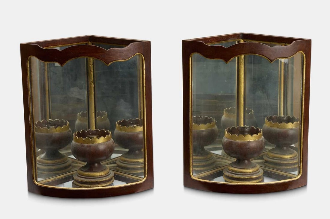 A pair of George II-style painted metal and glass wall lanterns by Colefax & Fowler, of recent: A pair of George II-style painted metal and glass wall lanterns by Colefax & Fowler, of recent manufacture, each of convex outline, with a twin mirrored back and bulbous baluster lamp holder, enclosed