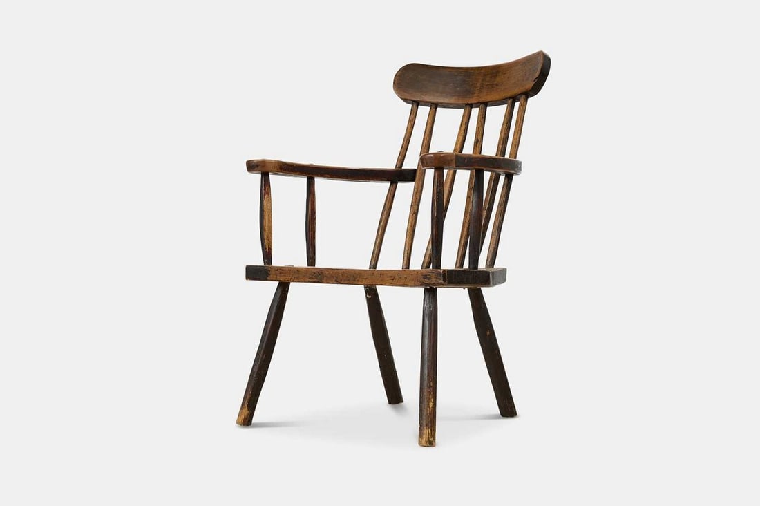 A painted beech ‘Gibson’ chair, 19th century, Irish,: A painted beech ‘Gibson’ chair, 19th century, Irish, with a concave top rail over a stick back splat, raised on splayed legs, with traces of original paint (61cm wide, 72cm deep, 87cm high) Condit