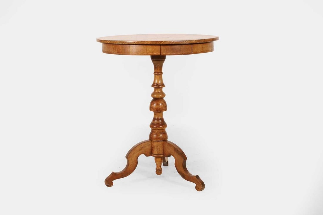 A Sorrento walnut and olivewood occasional table, 19th century,: A Sorrento walnut and olivewood occasional table, 19th century, the revolving circular crossbanded top centred by a figural scene depicting a gentleman and lady in period dress, enclosed within concen