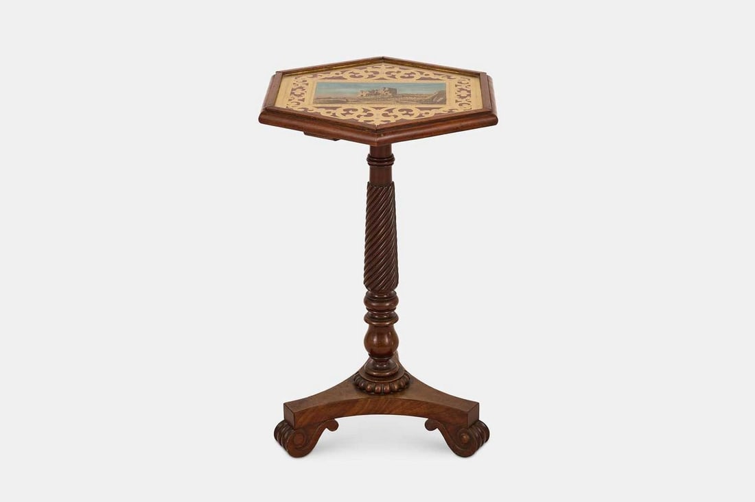 A William IV mahogany occasional table, circa 1835, in the manner of Gillows,: A William IV mahogany occasional table, circa 1835, in the manner of Gillows, the hexagonal verre églomisé top depicting Scarborough Castle, raised on a spiral-twist column terminating in a 