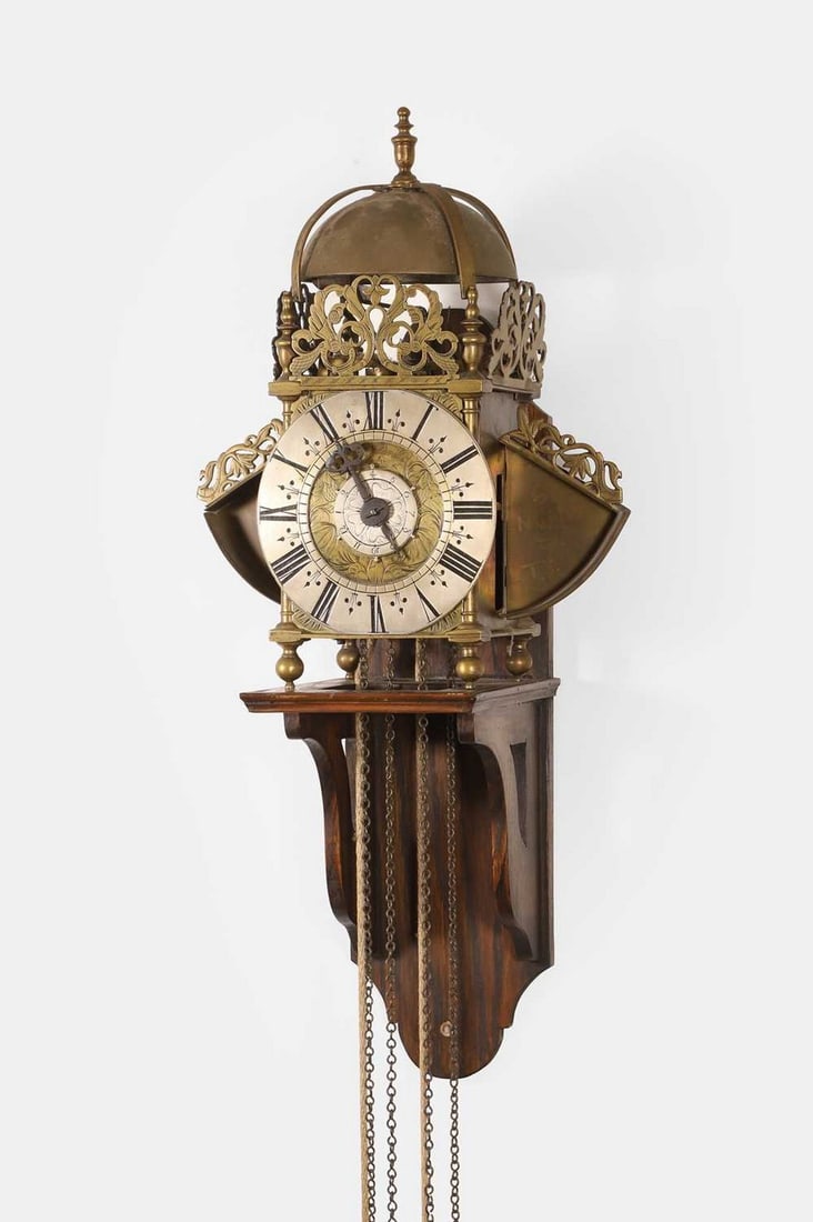 A brass winged lantern clock by Joseph Windmills, London, late 17th century, (1 of 2)