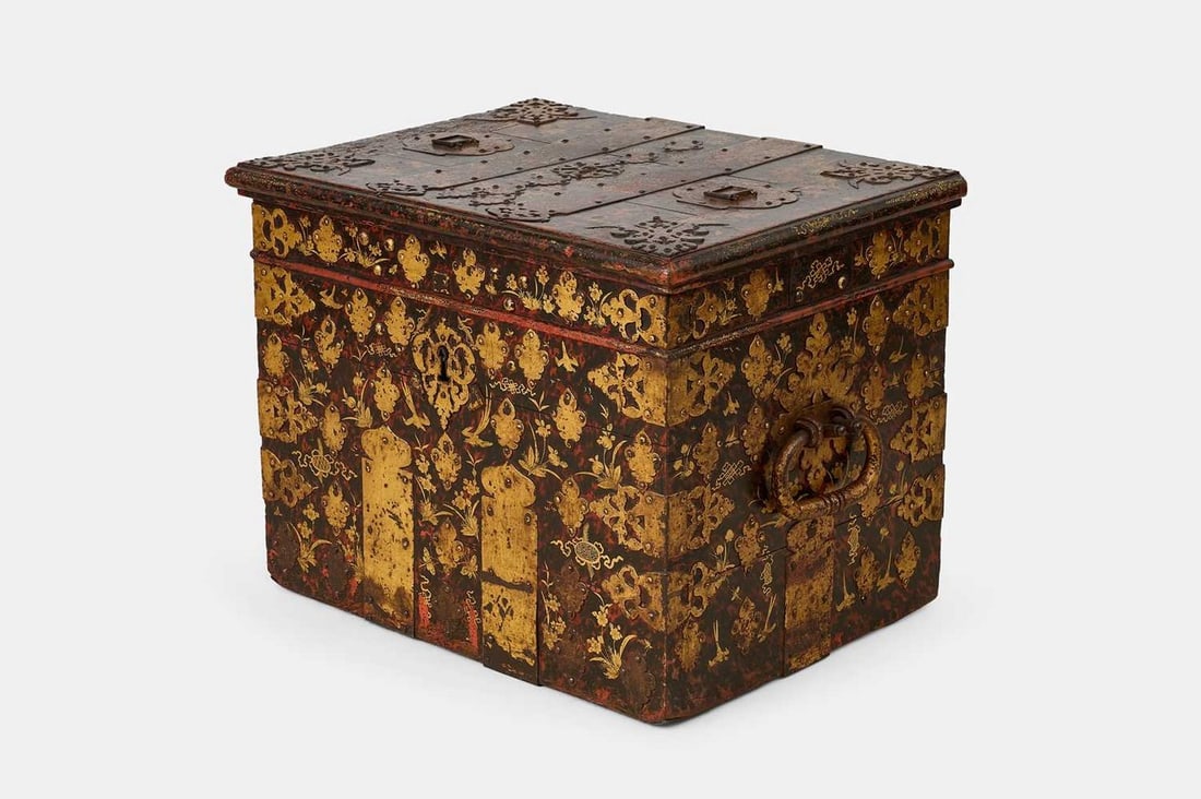 A painted and parcel-gilt wooden and cast iron strongbox, 17th century and later, (1 of 8)