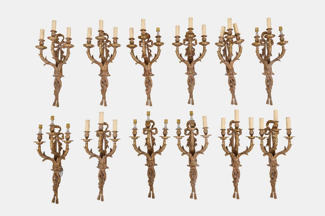 A set of twelve Louis XVI-style ormolu wall sconces, second quarter of the 20th century, French, (1 of 4)