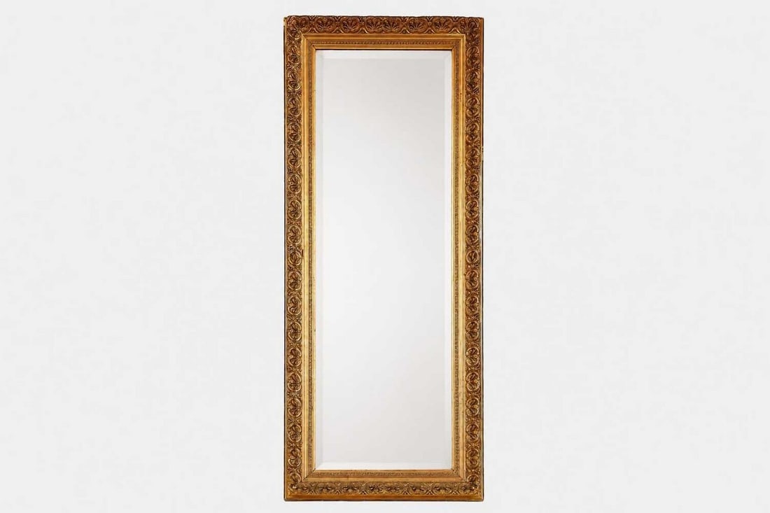 A carved giltwood mirror, 20th century, (1 of 3)