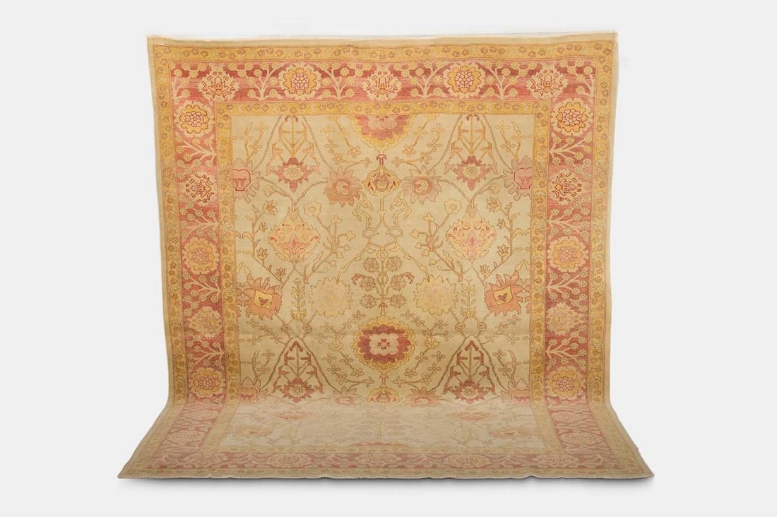 An Oushak wool carpet, 20th century, Anatolian, (1 of 3)