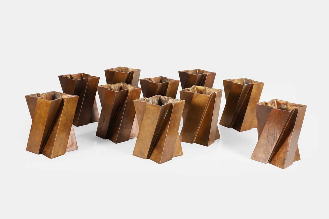 A group of ten modernist brass bookends, of recent manufacture, (1 of 4)