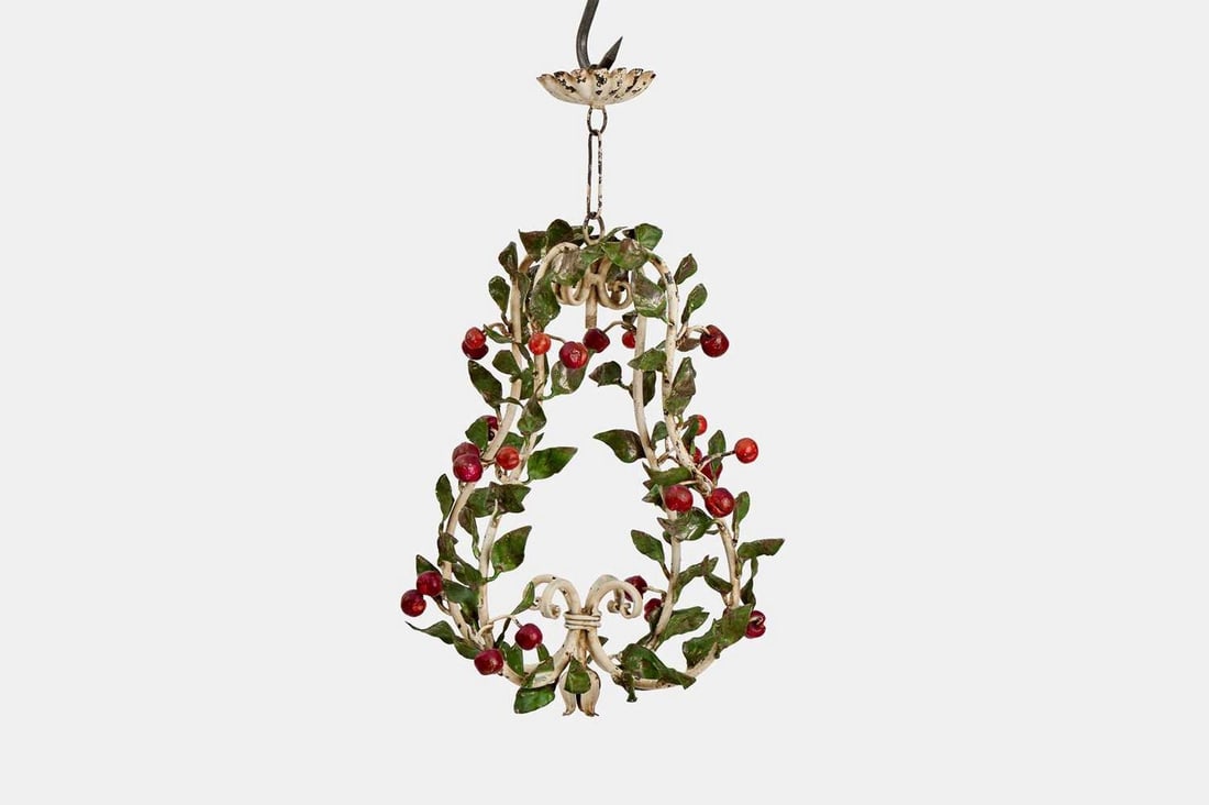 A toleware chandelier, first quarter of the 19th century, French,: A toleware chandelier, first quarter of the 19th century, French, the scrolling frame decorated with leaves and cherries (29cm wide, 29cm deep, 54cm high) Condition Report: With losses, flaking and cr