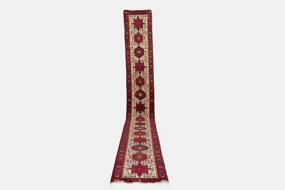 A Heriz wool runner, 20th century, Persian, (1 of 4)