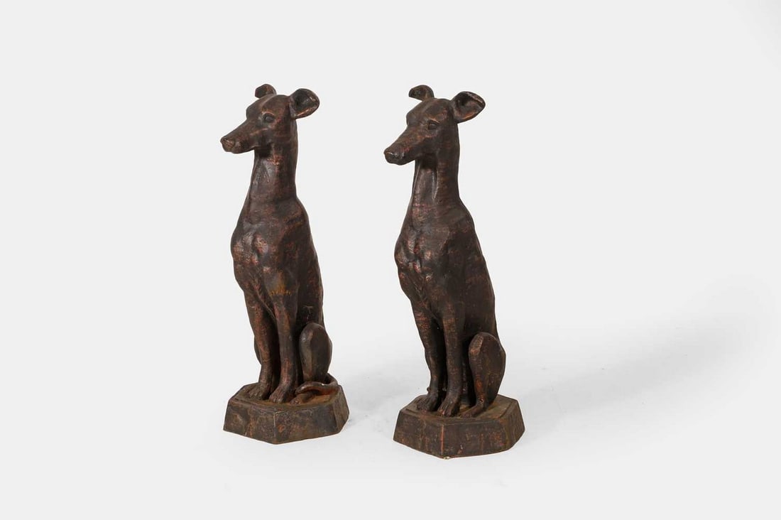 A pair of patinated cast iron whippets, of recent manufacture, (1 of 3)