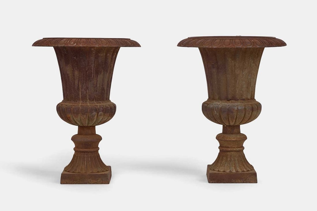 A pair of Victorian-style cast iron urns, 20th century, (1 of 3)