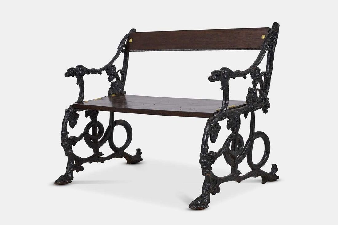 A small painted cast iron garden bench, second half of the 19th century, in the manner of (1 of 4)