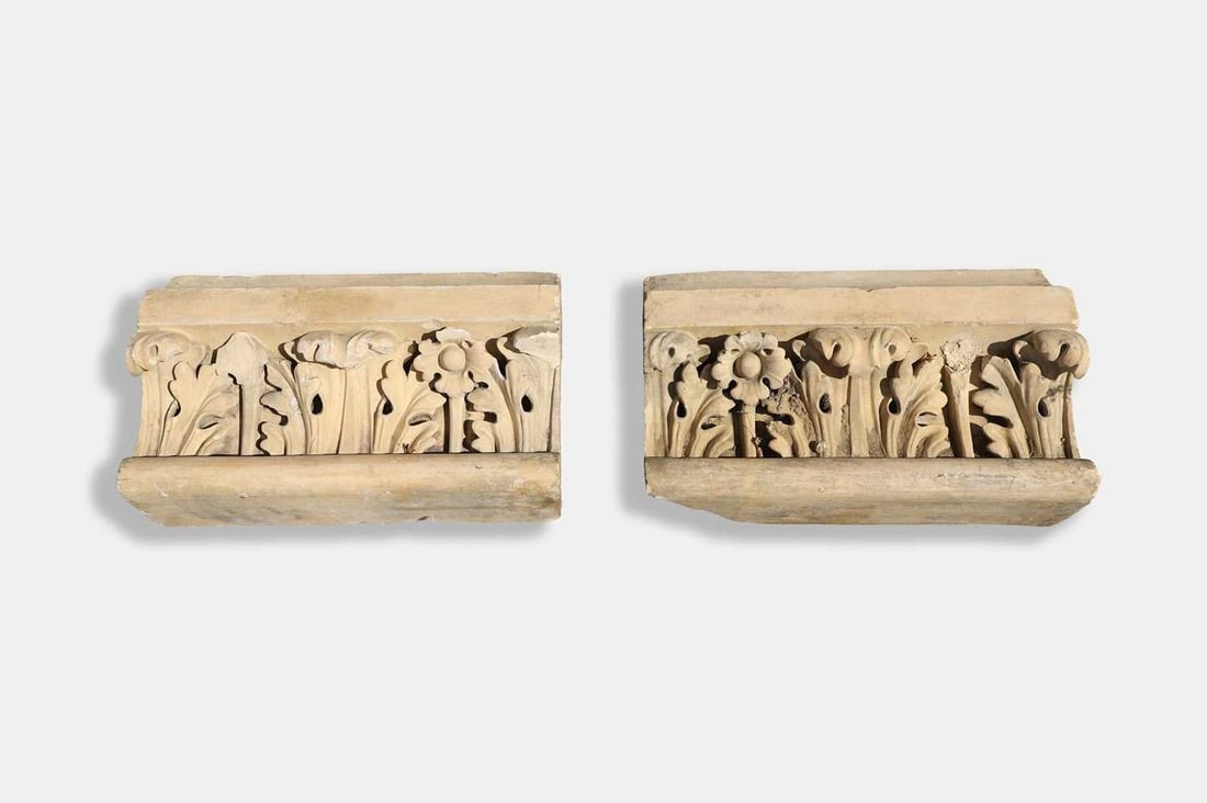 A pair of buff terracotta tiles by J Stiff & Sons of Lambeth, late 19th century,: A pair of buff terracotta tiles by J Stiff & Sons of Lambeth, late 19th century, each with a moulded top and acanthus detail (63cm wide, 21cm deep, 39cm high) (2)