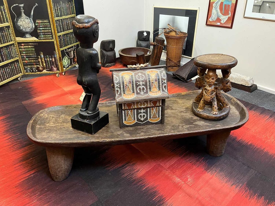A dugout hardwood table, 20th century, Senufo, Ivory Coast, - 16