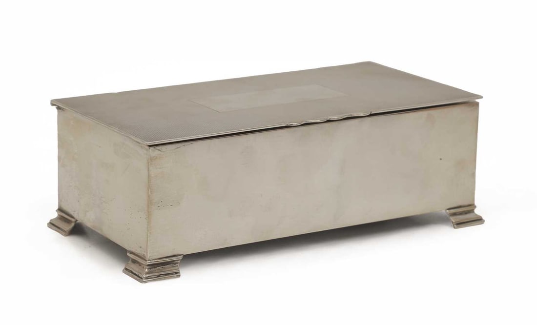 A silver cigarette box, by Mappin and Webb, London 1947, (1 of 2)