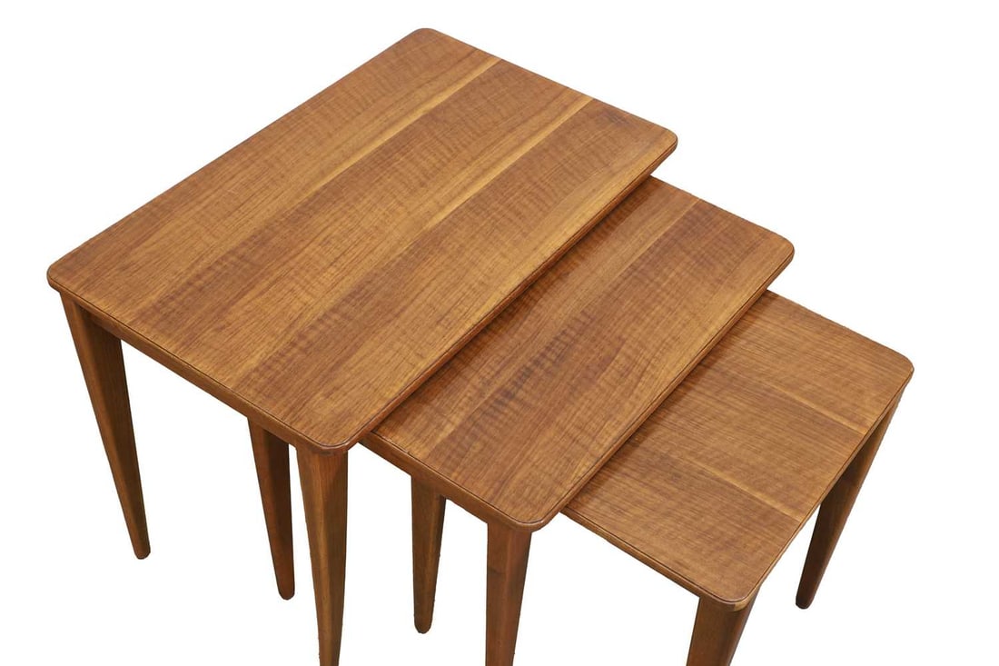 A Gordon Russell walnut nest of three tables, mid 20th century, - 2