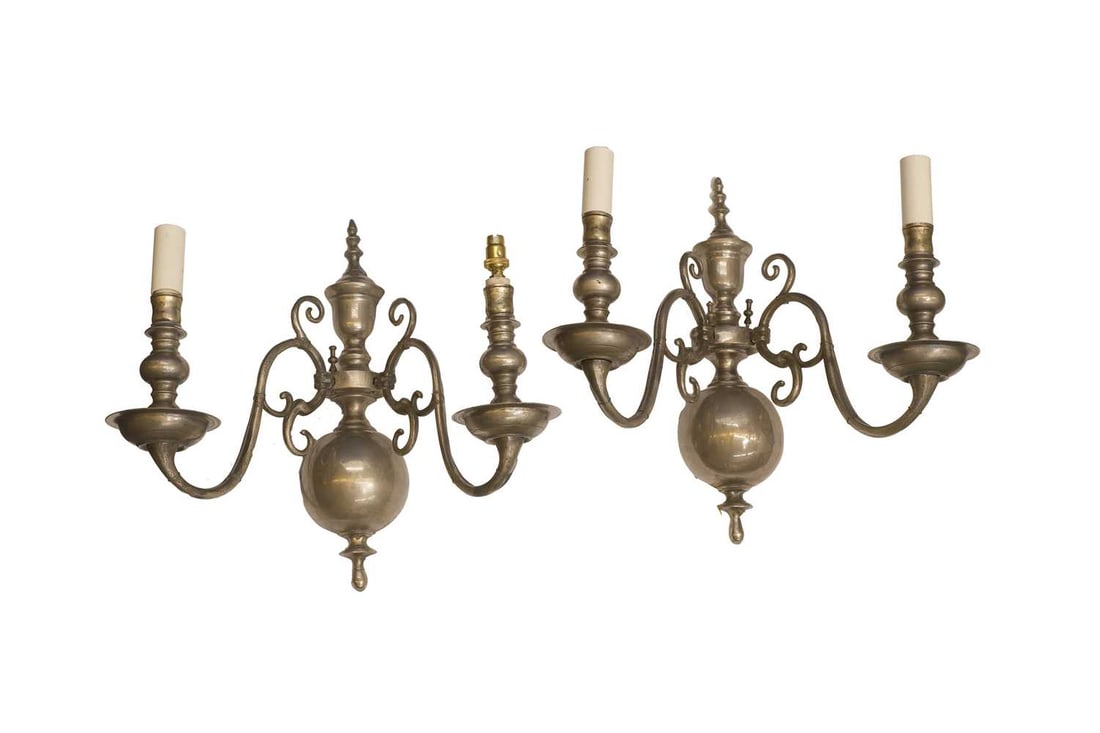 A pair of twin branch wall lights, early 20th century,: A pair of twin branch wall lights, early 20th century, in the Dutch style, silver finish, each with scrolled branches 38cm wide, 39cm high 2