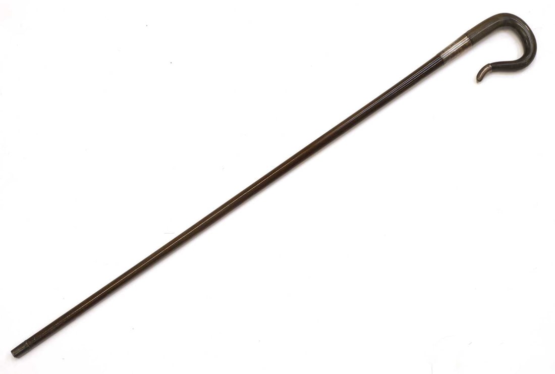 A silver and horn-mounted walking cane, makers mark C.C., London, 1893, stamped Brigg, (1 of 2)