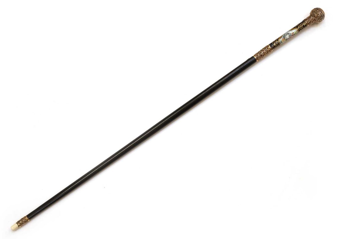 A Continental porcelain and brass-mounted walking cane, circa 1900, (1 of 2)