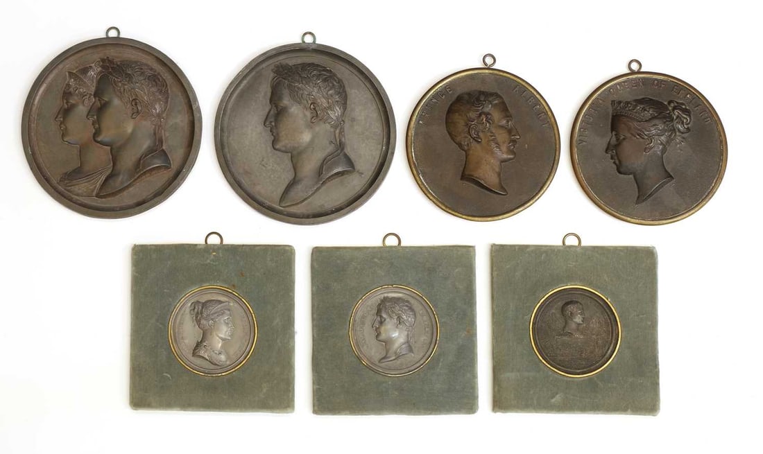 A group of Napoleonic plaques, 19th century and later,: A group of Napoleonic plaques, 19th century and later, including, four of Napoleon, two of Josephine, together with a pair faux brass portraits of Prince Albert and Queen Victoria,