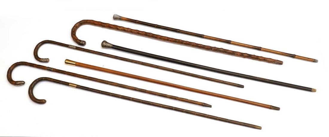 A collection of silver-mounted walking canes 19th century and later: A collection of silver-mounted walking canes 19th century and later to include examples by Brigg 96cm long (qty.)
