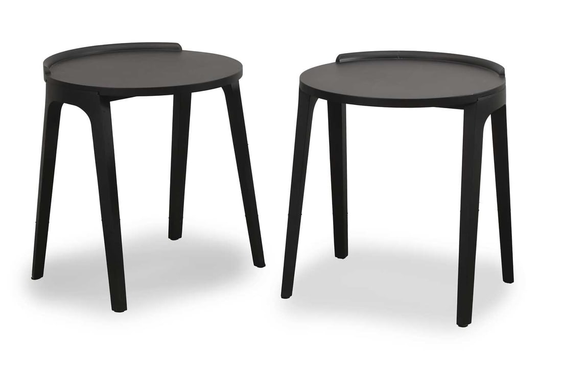 Paolo Salvadè Italian, b.1960) for Porada, a pair of 'Deck' ebonised side tables,: Paolo Salvadè Italian, b.1960) for Porada, a pair of 'Deck' ebonised side tables, of recent manufacture, the circle top raised on four angled legs, with applied manufacturer's label 46cm diameter