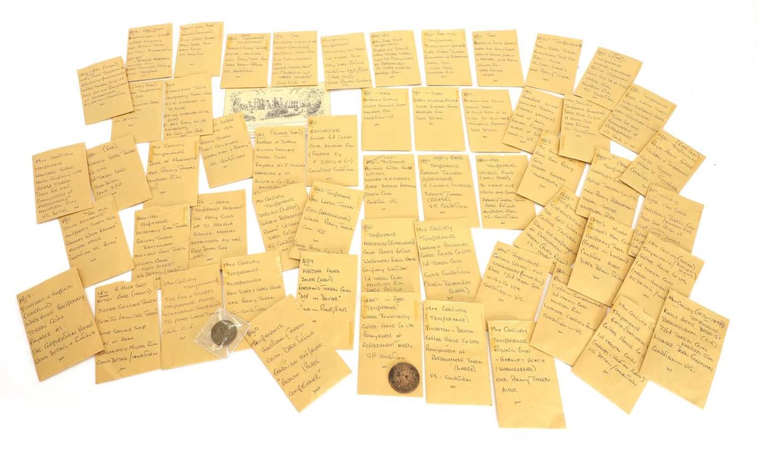 A collection of approximately 55 tokens,: A collection of approximately 55 tokens, to include a Masonic Lodge Dunedin 1316 Lodge penny token, a Norfolk & Suffolk silver shilling, a Lincoln silver shilling token, and a Bradford shilling