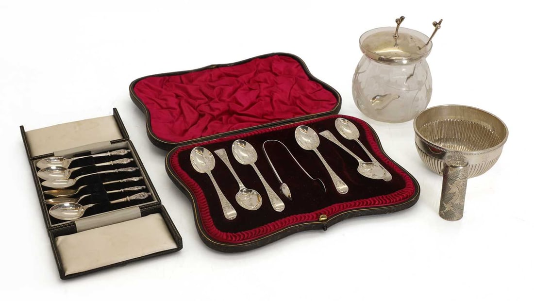 A set of six silver apostle coffee spoons, Birmingham, 1956,: A set of six silver apostle coffee spoons, Birmingham, 1956, cased, and a further set of six teaspoons and sugar tongs, London,1904, cased, a silver bowl, a silver mounted preserve pot and cover, with