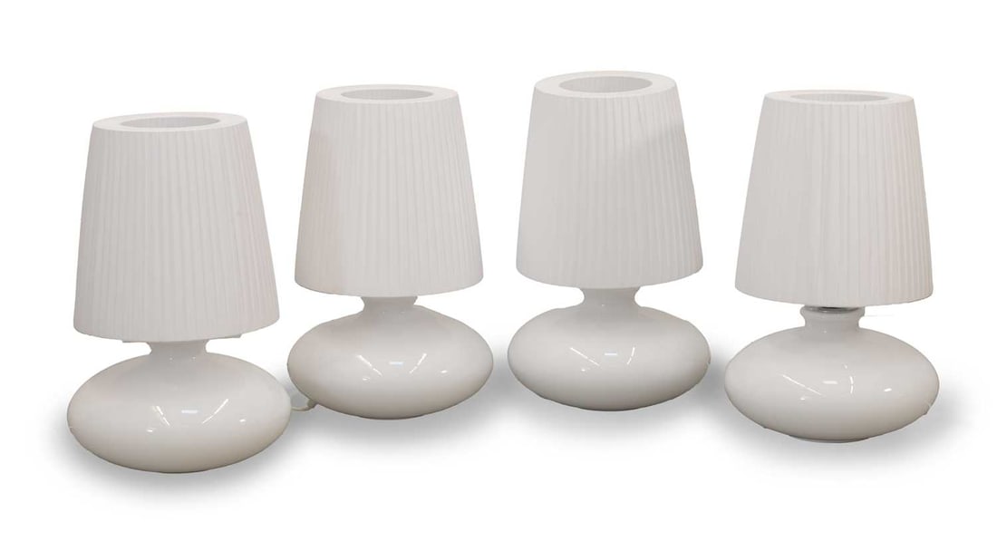 A collection of four Bover lamps, of modern manufacture: A collection of four Bover lamps, of modern manufacture all of circular form with white frosted glass bases, and white pleated shades 31cm wide, 24cm high 8 Condition Report: PAT passed 04.09.26