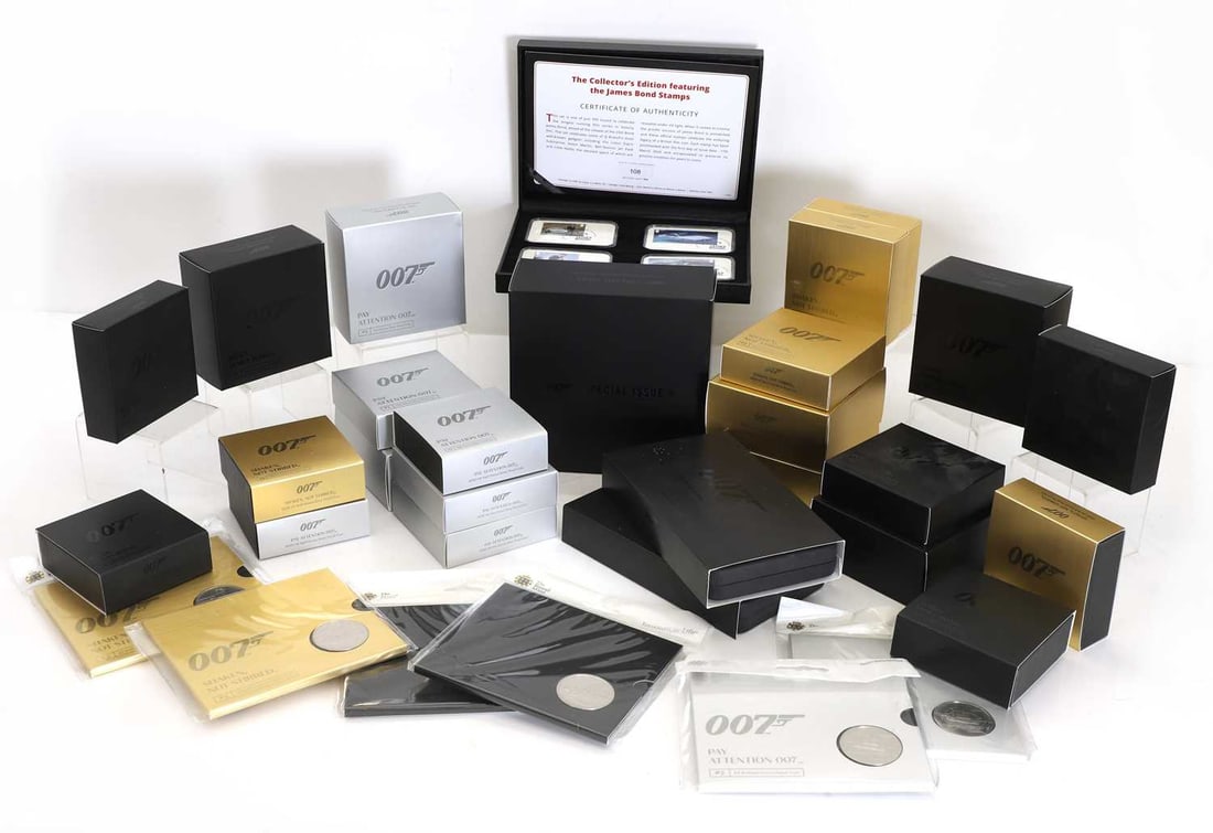 A collection of The Royal Mint 007 silver coins,: A collection of The Royal Mint 007 silver coins, comprising a five-ounce coin, seven two-ounce coins, nine ounce coins, six half-ounce, together with six cupro-nickel £5 coins, and a limited