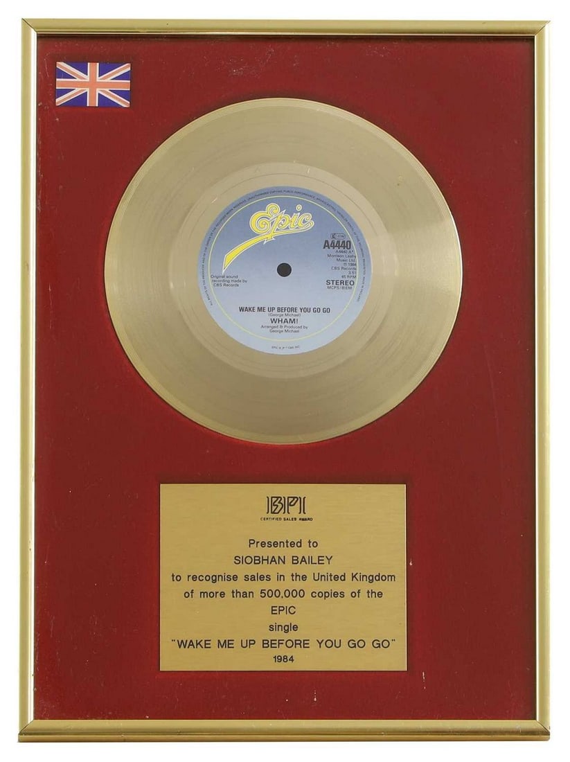 A gold disc, Wham!, 'Wake Me Up Before You Go-Go',: A gold disc, Wham!, 'Wake Me Up Before You Go-Go', with a presentation plaque inscribed 'Presented to Siobhan Bailey to recognise sales in the United Kingdom of more than 500,000 copies of the Epic