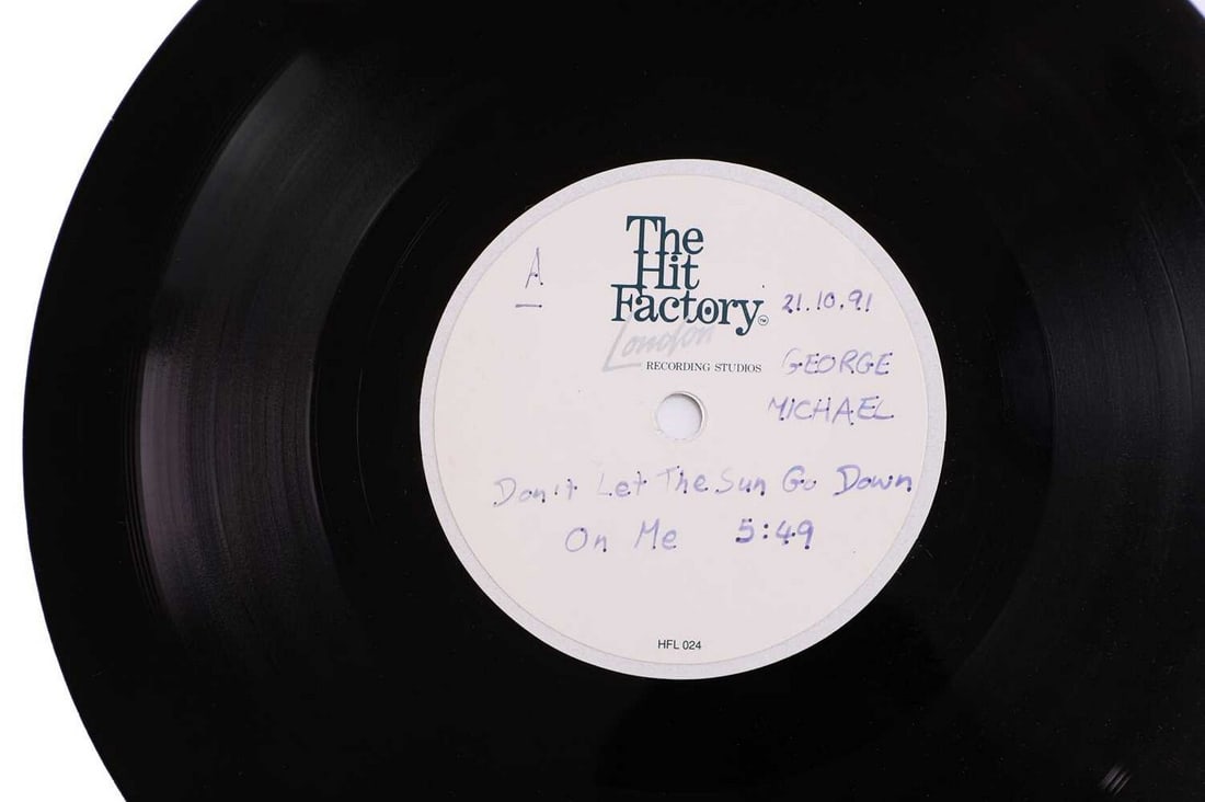 George Michael, a 7-inch acetate single,: George Michael, a 7-inch acetate single, The Hit Factory, London, the handwritten label reads 'George Michael 'Don't Let The Sun Go Down On Me', 5.49, 21.10.91 and 'I Believe When I Fall In Love (It W