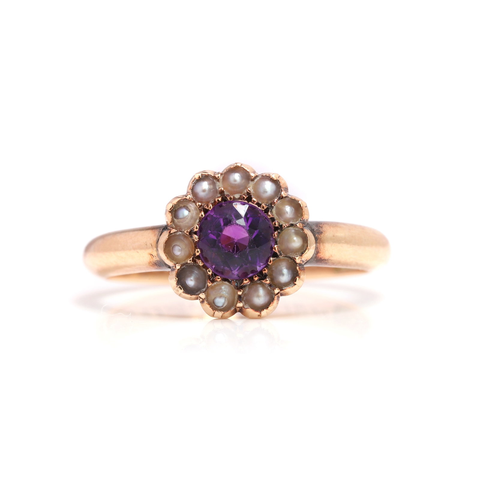An Edwardian amethyst and split pearl cluster ring, (1 of 2)