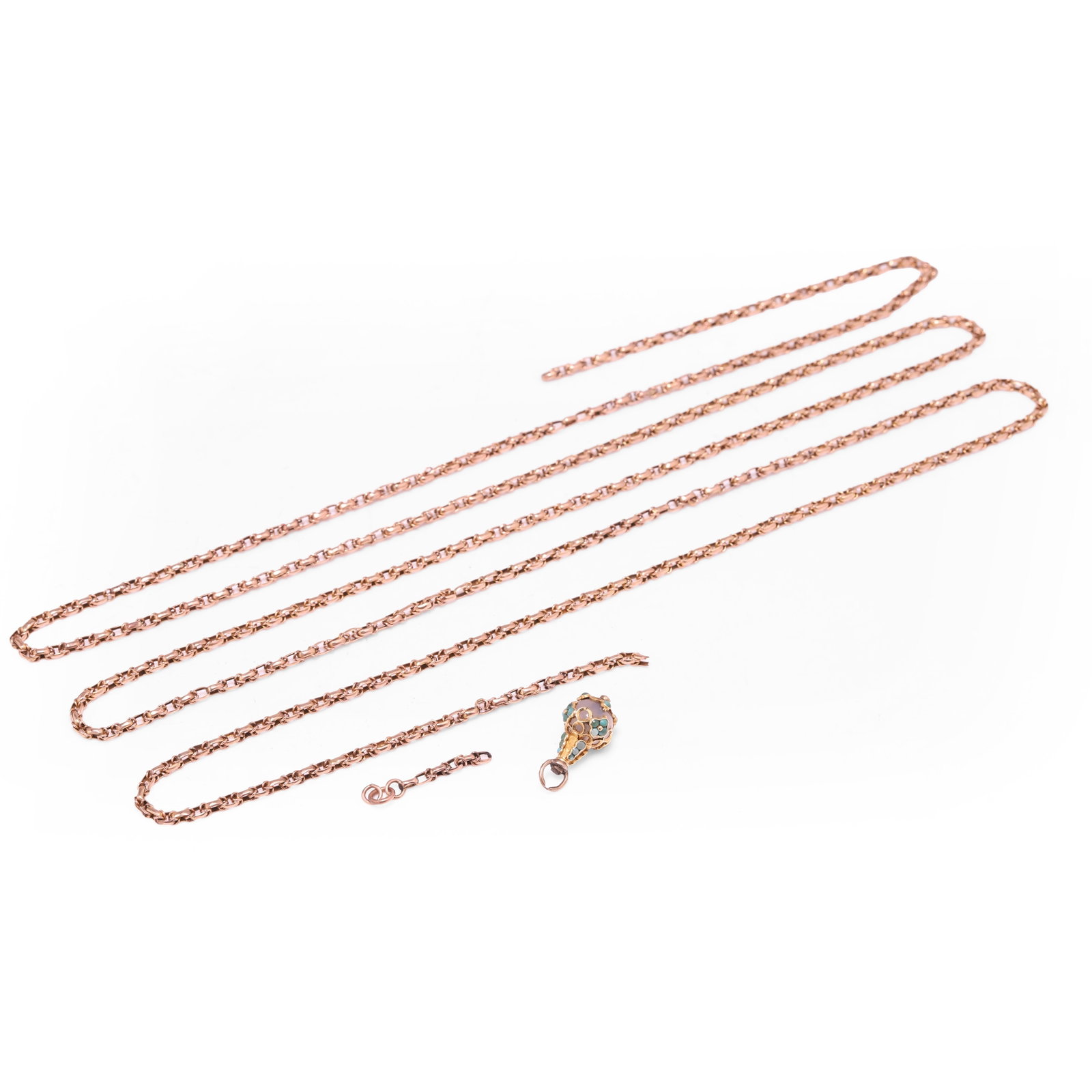 A Victorian long chain and a Victorian turquoise set charm/pendant,: A Victorian long chain and a Victorian turquoise set charm/pendant, the fancy link guard chain, broken, in unmarked rose gold tested as approximately 9ct, with an extra link section and a Victorian ch