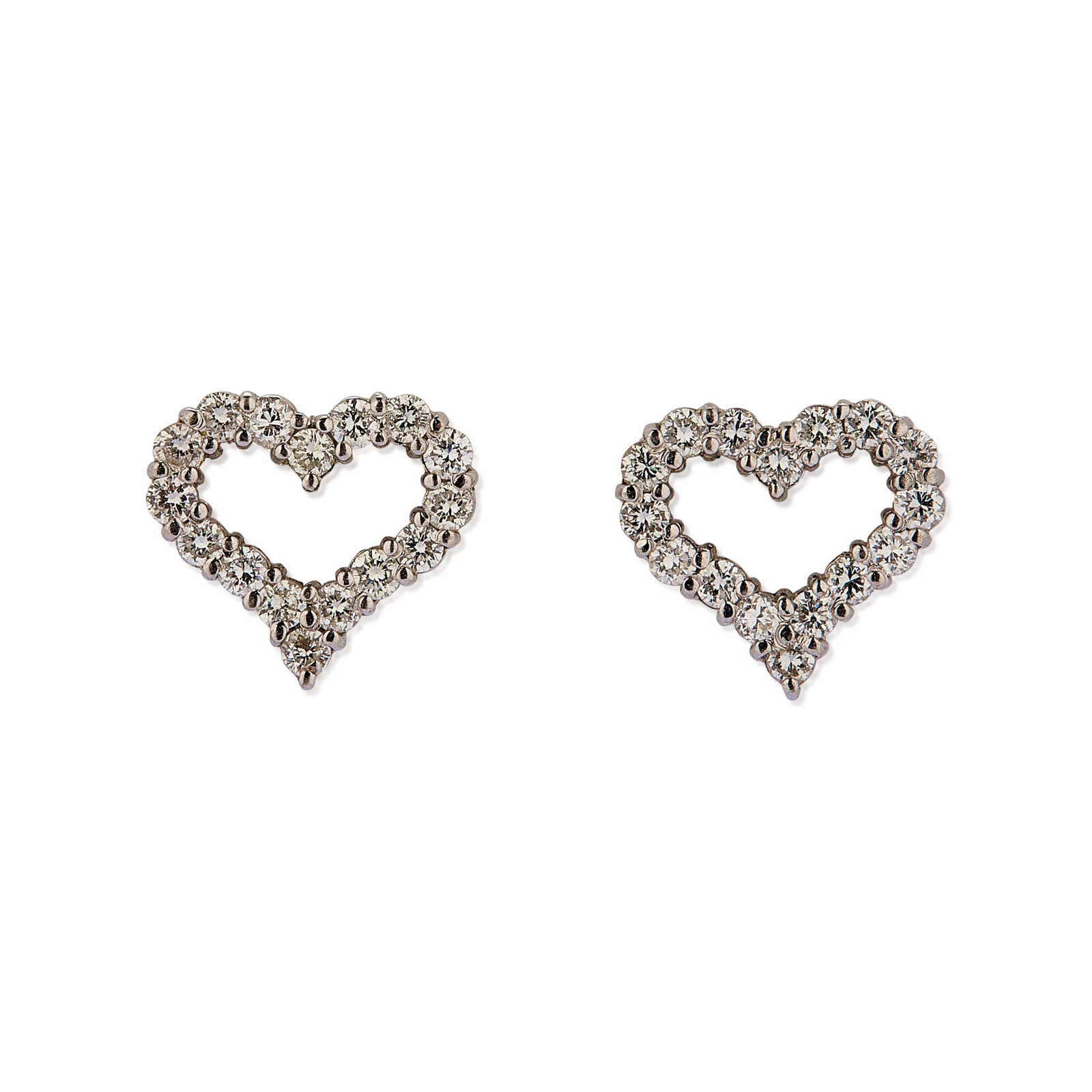 A pair of diamond heart shaped earrings,: A pair of diamond heart shaped earrings, claw set in a heart outline to a pin and butterfly fitting, unmarked, tested as approximately 18ct white gold (Width 1.2cm; 2.9g) Condition Report: Light