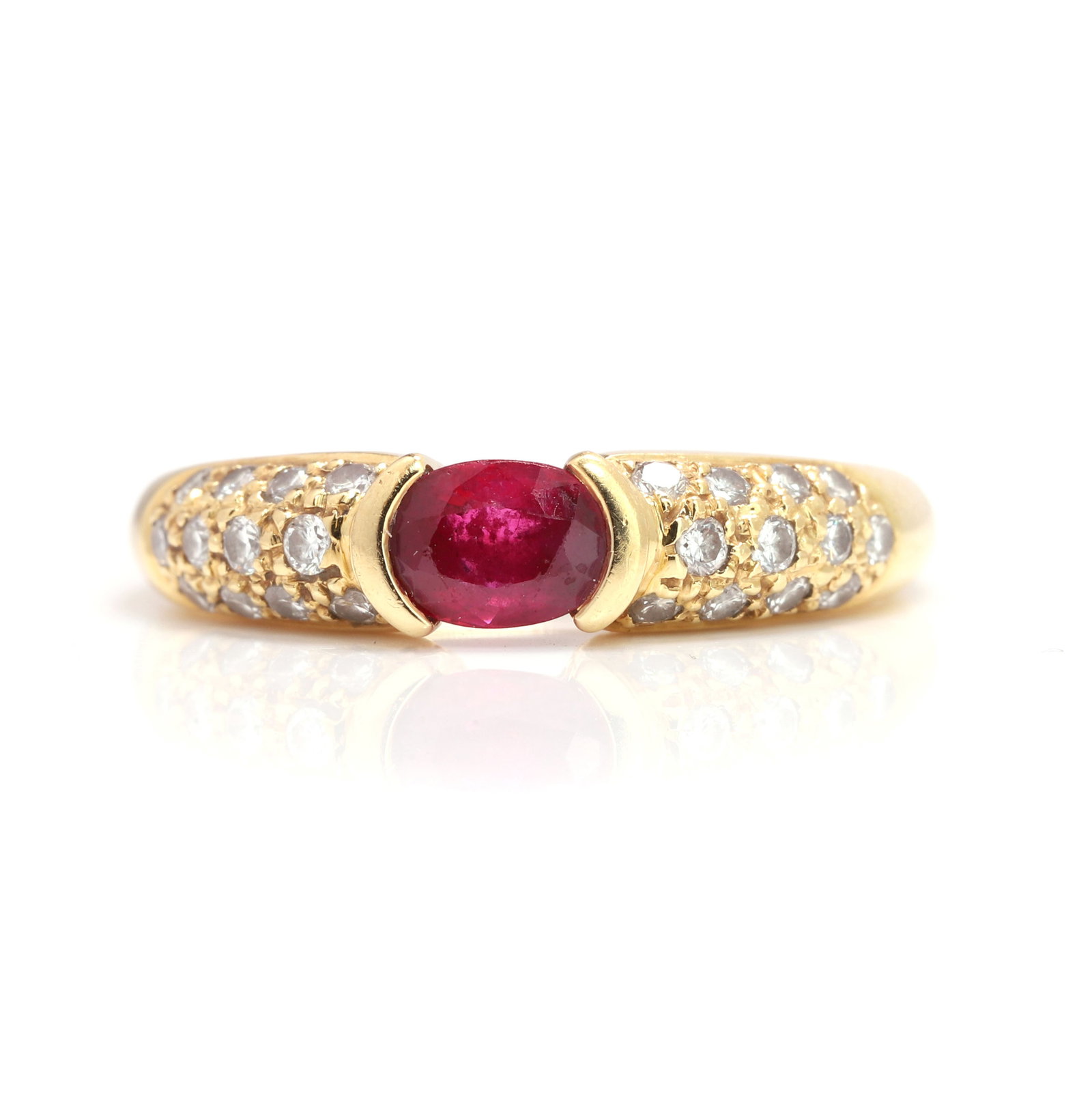 An 18ct gold ruby and diamond ring, (1 of 2)