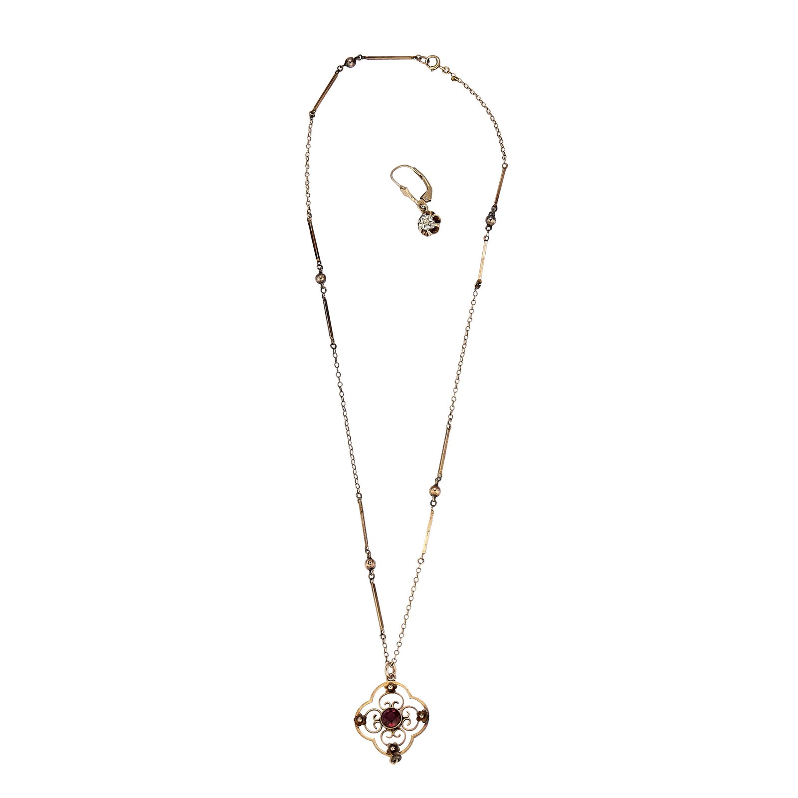 A chain and a single diamond earring,: A chain and a single diamond earring, the bar and trace link chain with ball spacers, testing as approximately 9ct gold, suspending a paste set rolled gold pendant, together with a single drop