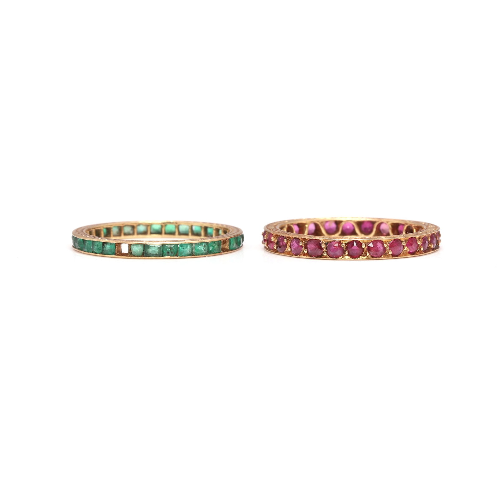 Two coloured gemstone set eternity rings, (1 of 2)