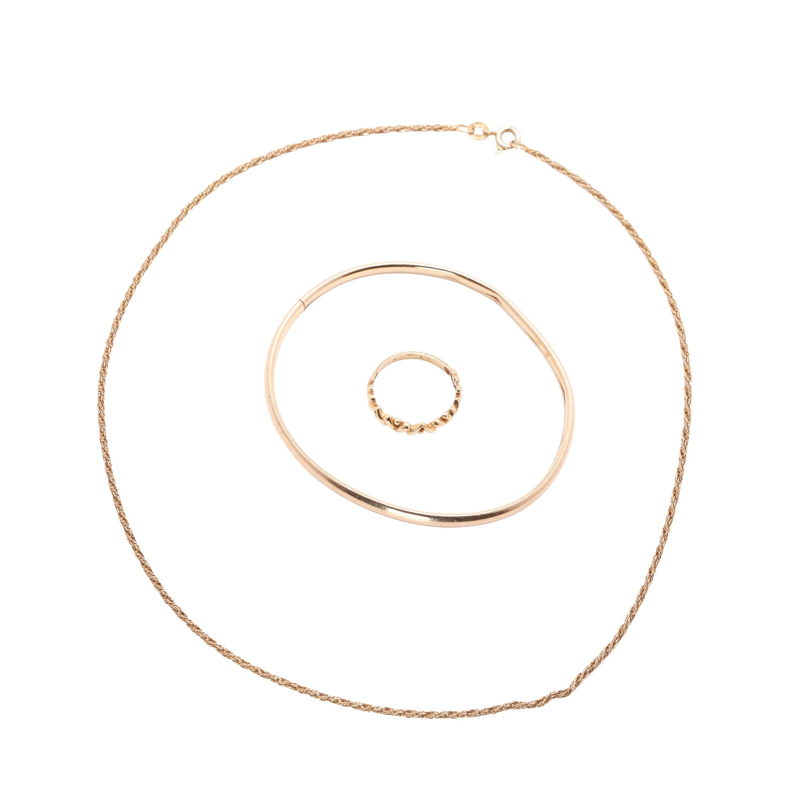 A small group of jewellery,: A small group of jewellery, comprising a rope-twist chain by Unoaerre, stamped 585, Italian marks, together with a band ring and a hollow bangle, both tested as approximately 9ct gold (3) Condition Re