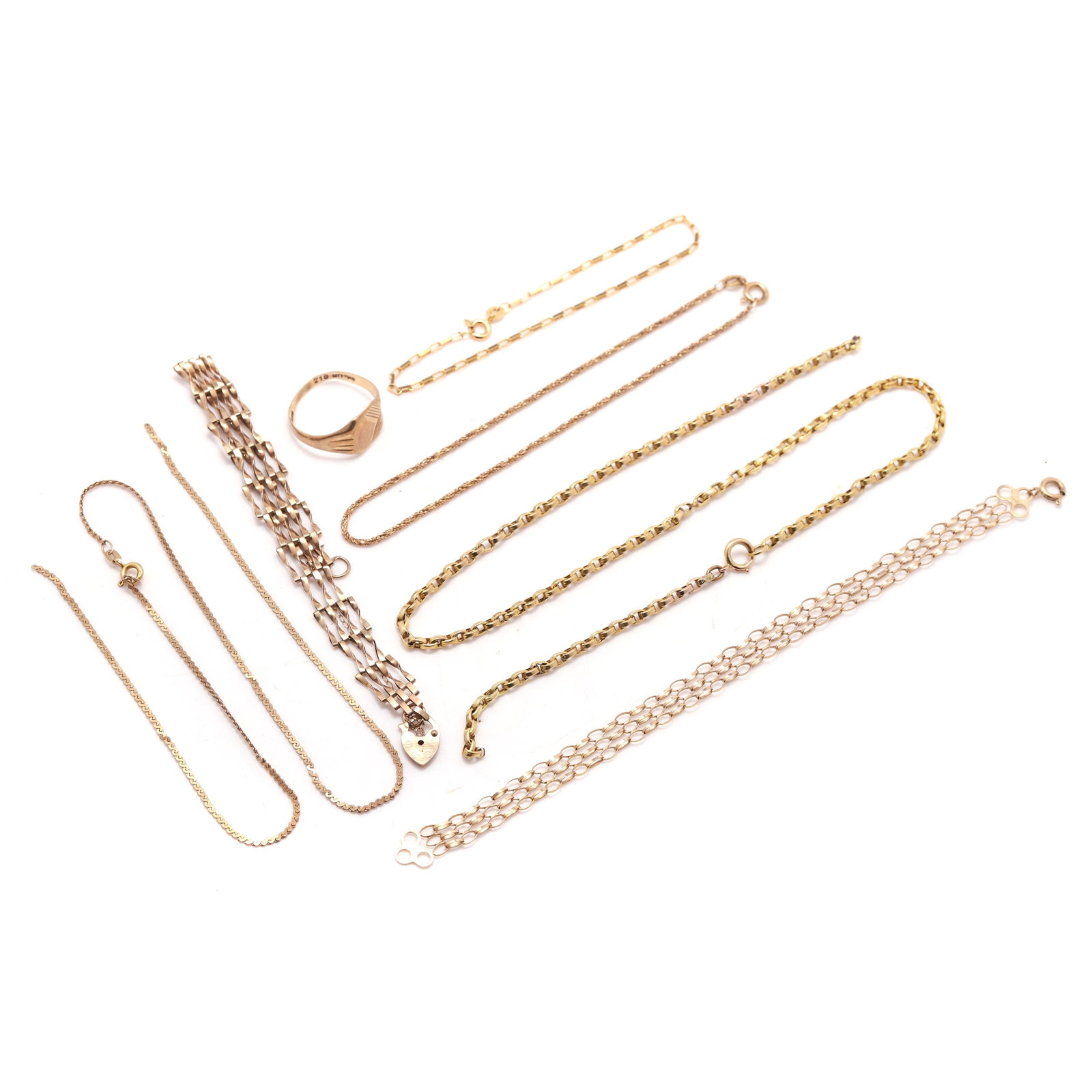 A collection of 9ct gold jewellery and oddments,: A collection of 9ct gold jewellery and oddments, comprising a hollow gold gate bracelet to a heart padlock, hallmarked Dublin, a mesh bracelet, London import hallmark, a Prince of Wales bracelet, Lond
