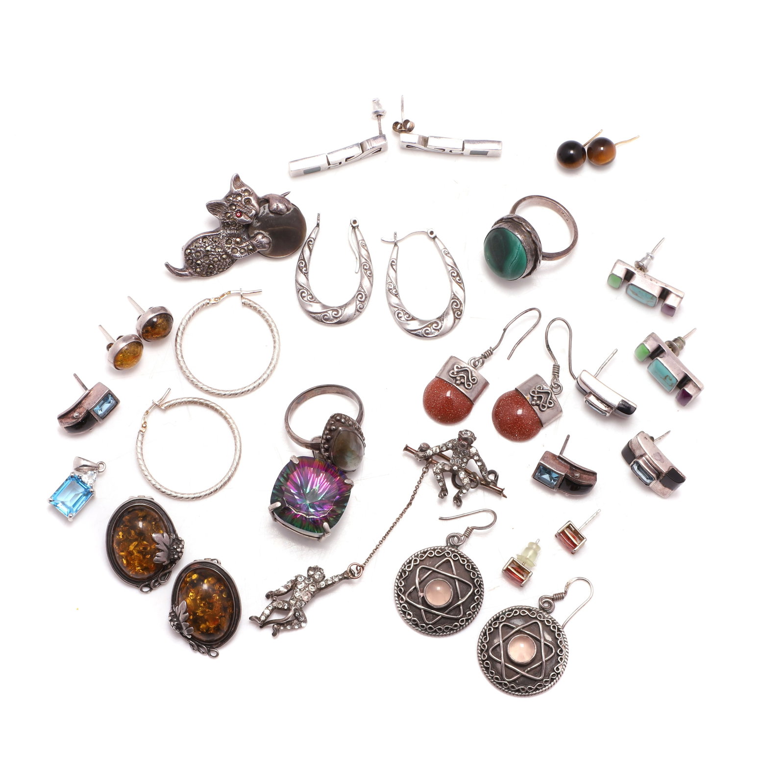 A collection of semi-precious gemstone jewellery,: A collection of semi-precious gemstone jewellery, comprising a pair of pressed amber clip on earrings, a marcasite and mother of pearl novelty brooch in the form of a cat playing with a ball, a pair o