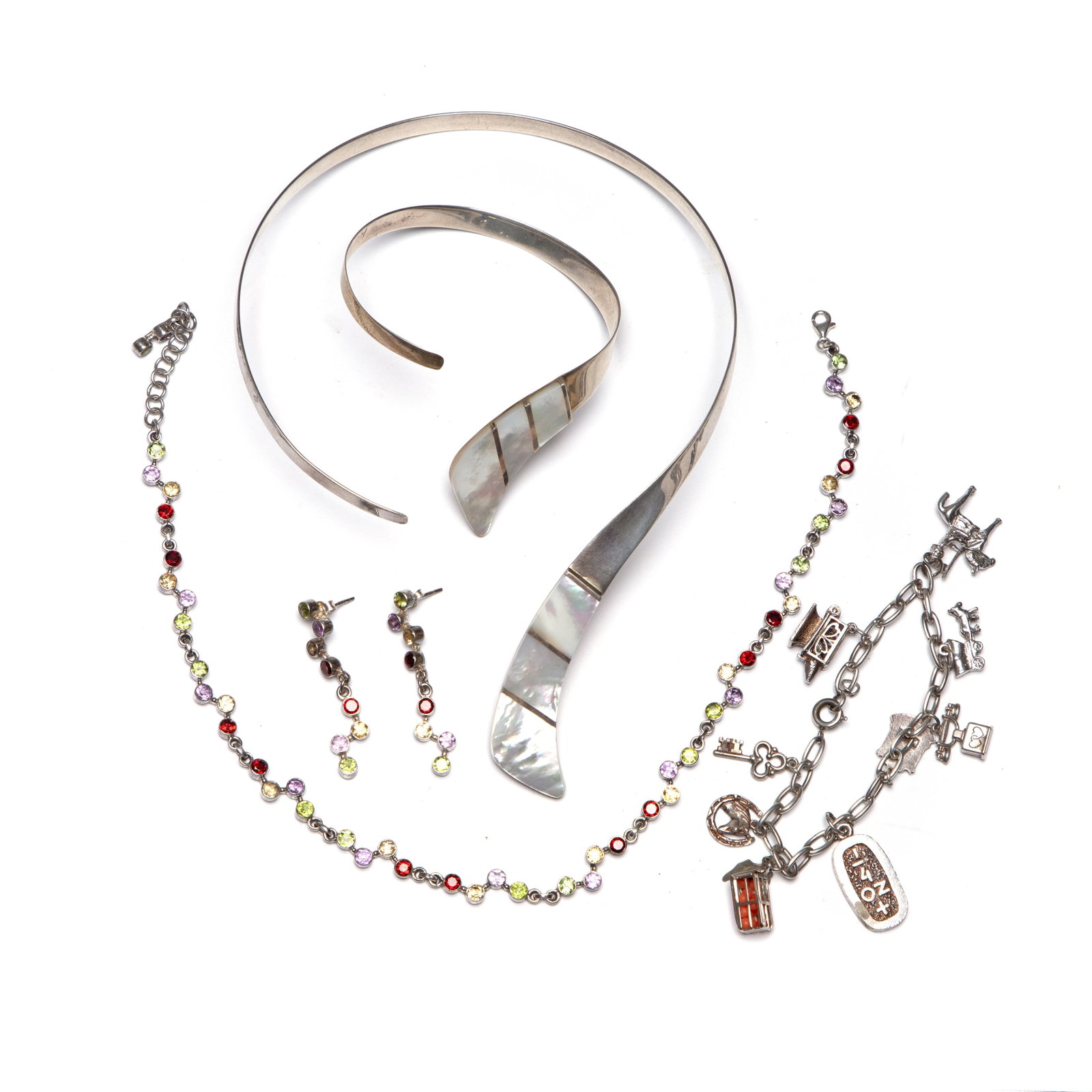 A group of silver jewellery,: A group of silver jewellery, to include a necklace and drop earrings set composed of rub over set garnet, amethyst, citrine and amethyst with chain links and lobster clasp, tested as silver, a torque 