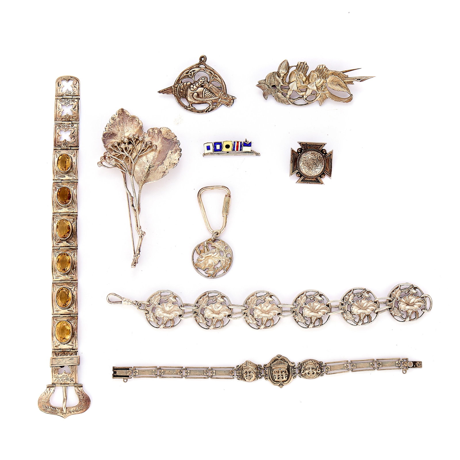 A collection of mostly silver jewellery, late 19th century - mid 20th century,: A collection of mostly silver jewellery, late 19th century - mid 20th century, including a Scottish buckle bracelet set with six oval citrine to six engraved, hinged panels, unmarked, tested as silver