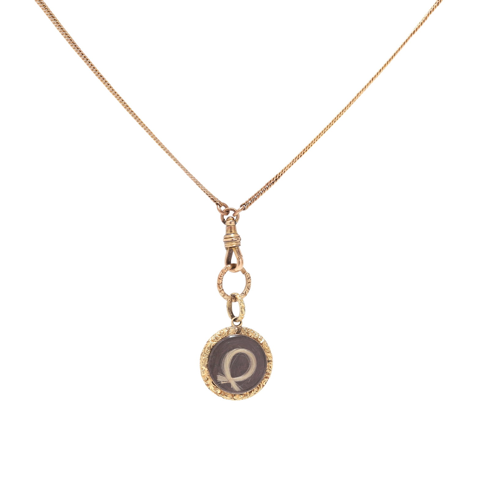 A muff chain suspending a Georgian mourning locket, (1 of 2)