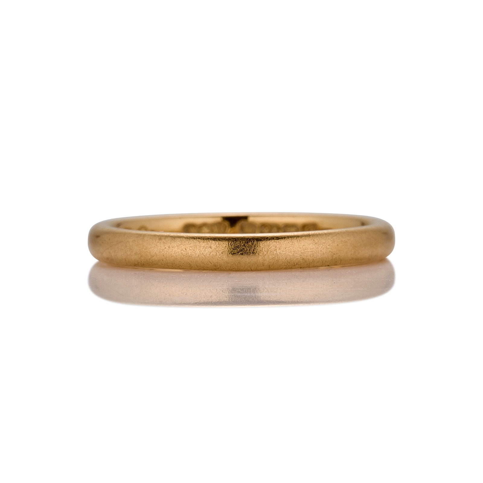 A 22ct gold band ring, (1 of 2)