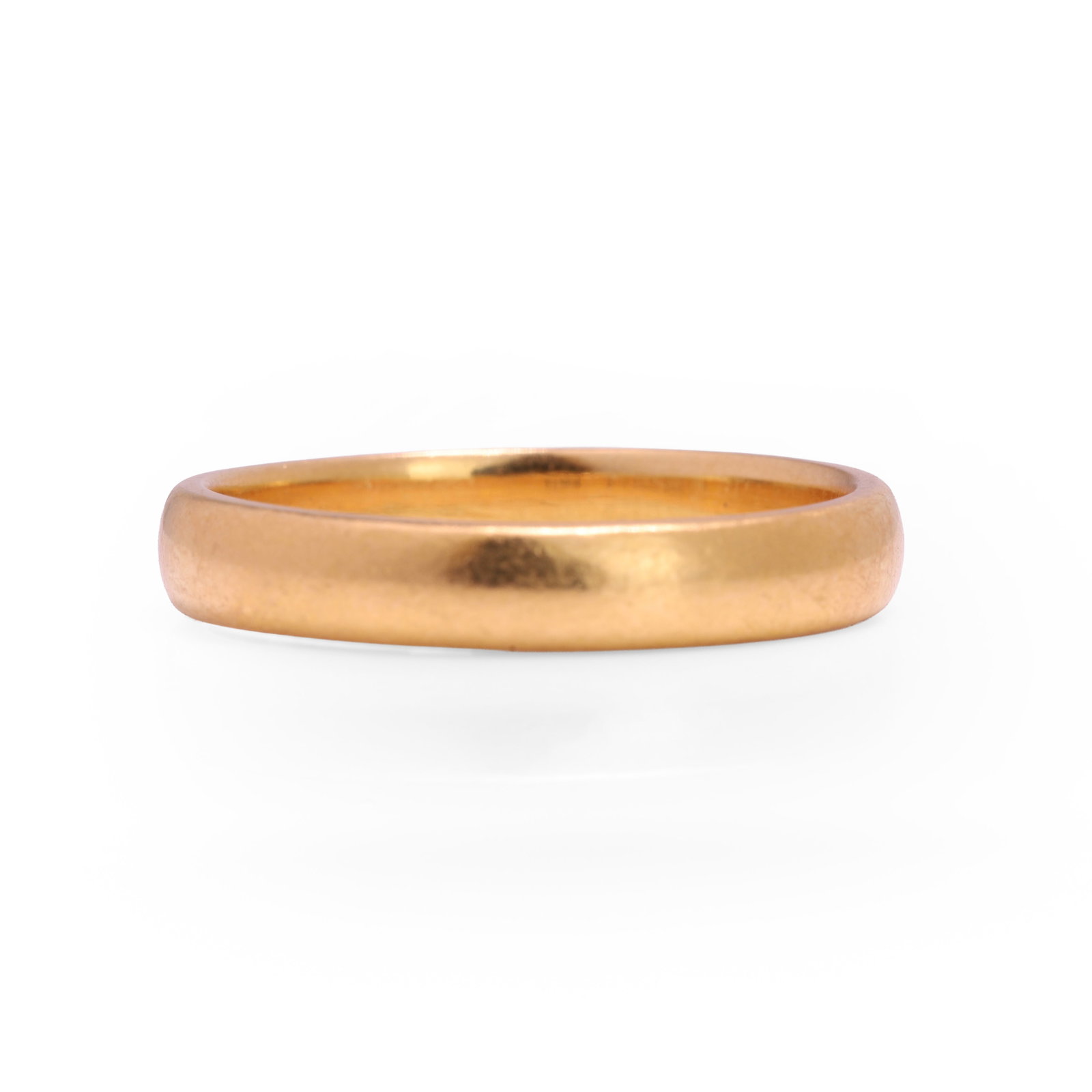 A 22ct gold wedding band,: A 22ct gold wedding band, hallmarked Birmingham 1918 (Ring size P; 5.1g) Condition Report: Scratches and marks. Dimensions: Ring size P; 5.1g
