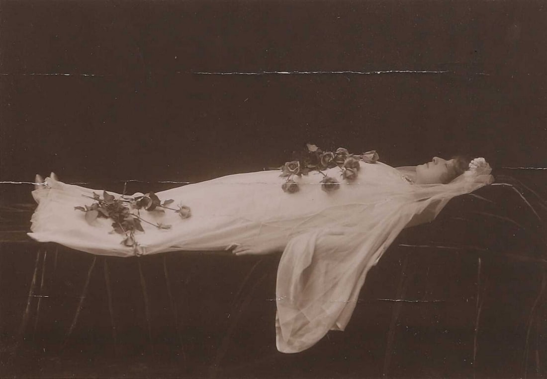 A photograph of Dame Nellie Melba as Juliette from 'Roméo et Juliette' From Dover Street: A photograph of Dame Nellie Melba as Juliette from 'Roméo et Juliette' From Dover Street Studios, London inscribed 'Madame Melba in (Death Scene) ''Juliette''' verso (26 x 31cm; framed 32.5 x 42.