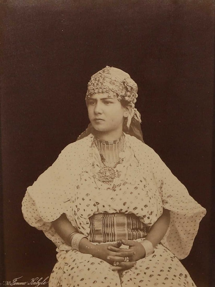 A group of albumen prints of different nationalities, 19th century and later,: A group of albumen prints of different nationalities, 19th century and later, with people from India, South Africa, Algiers and Java, with some nudes (the majority mounted 51 x 40cm overall; unframed)